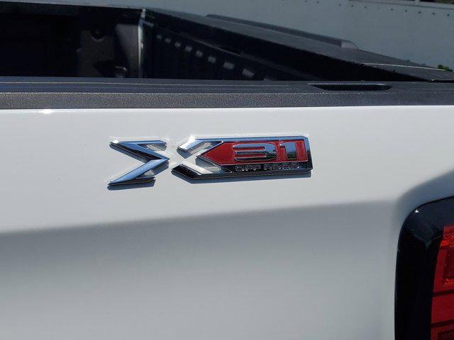Photo of 2021 Summit White GMC Sierra 1500
