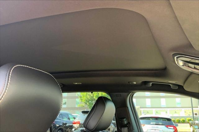 Photo of 2024 Diamond Black Crystal Pearlcoat Jeep Grand Cherokee L
