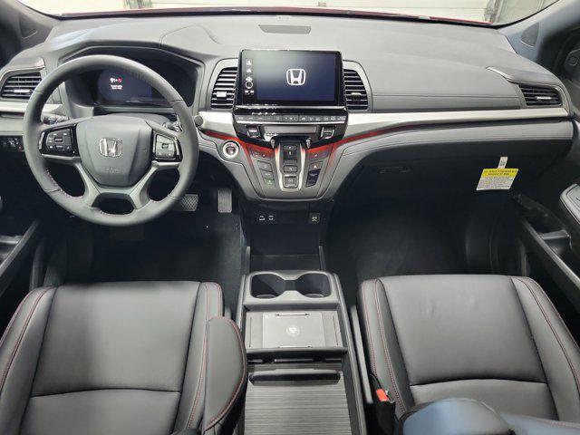 Photo of 2025 Radiant Red Metallic II Honda Odyssey