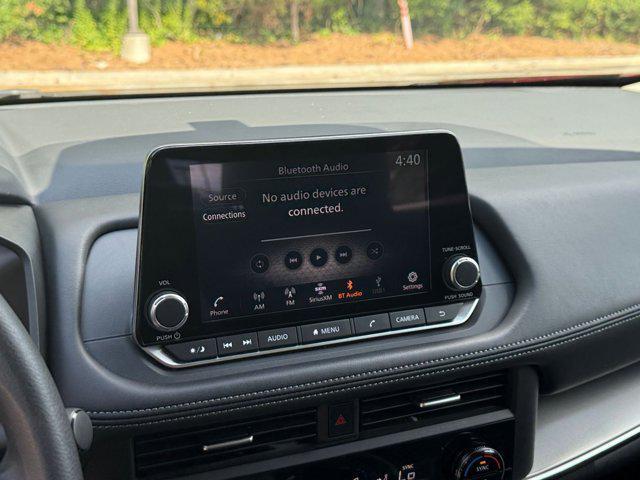 Photo of 2024 Scarlet Ember Tintcoat Nissan Rogue