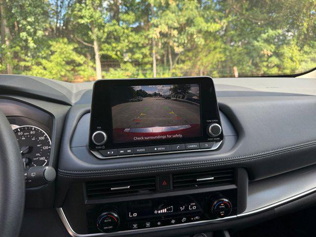 Photo of 2024 Scarlet Ember Tintcoat Nissan Rogue