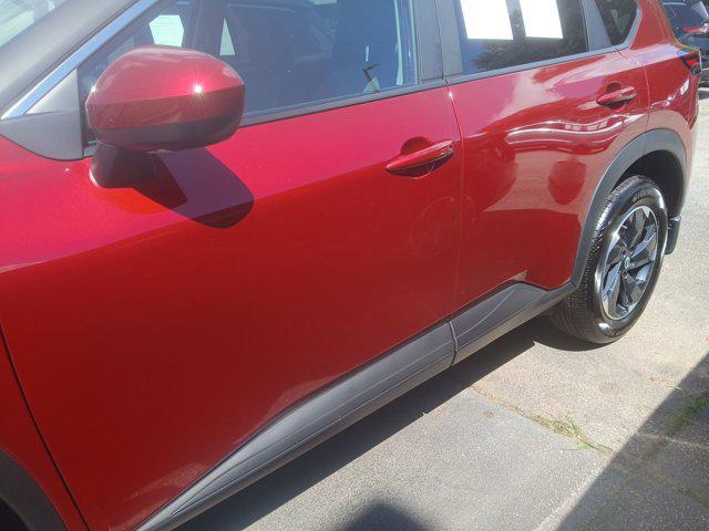 Photo of 2024 Scarlet Ember Tintcoat Nissan Rogue