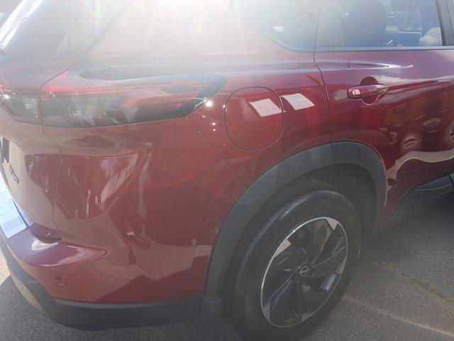 Photo of 2024 Scarlet Ember Tintcoat Nissan Rogue