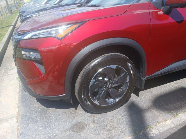 Photo of 2024 Scarlet Ember Tintcoat Nissan Rogue