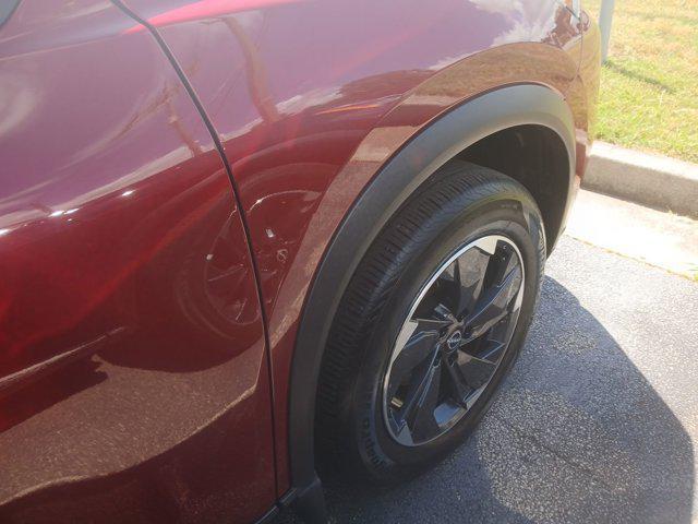 Photo of 2024 Scarlet Ember Tintcoat Nissan Rogue