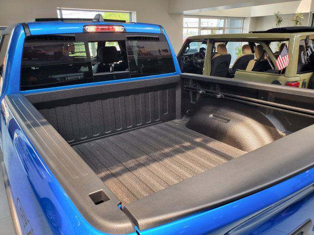 Photo of 2025 Hydro Blue Pearlcoat RAM 1500