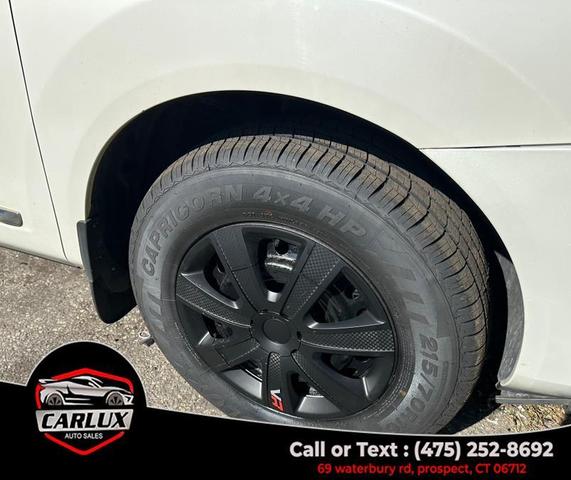 Photo of 2013 Pearl White Nissan Rogue