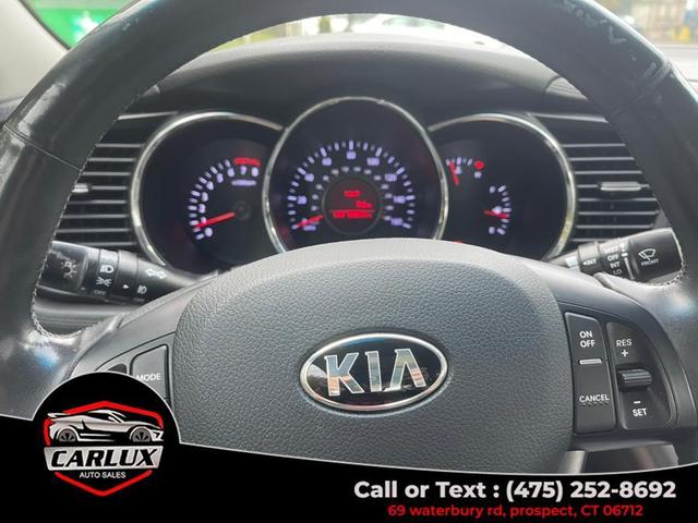 Photo of 2013 Ebony Black Kia Optima