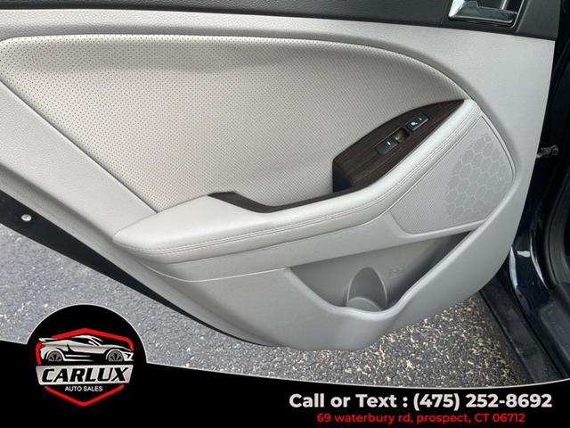 Photo of 2013 Ebony Black Kia Optima
