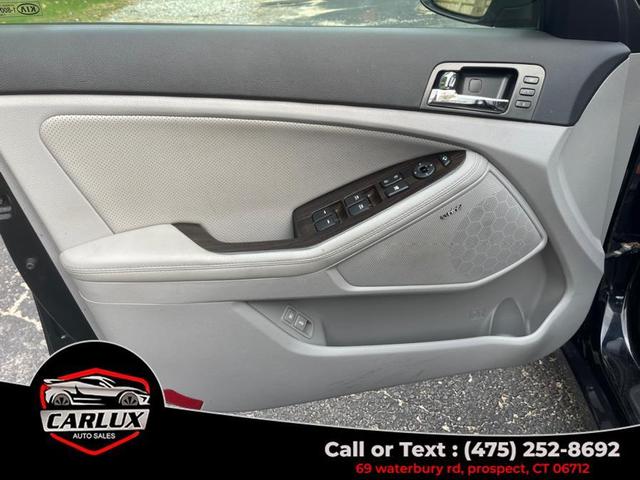Photo of 2013 Ebony Black Kia Optima