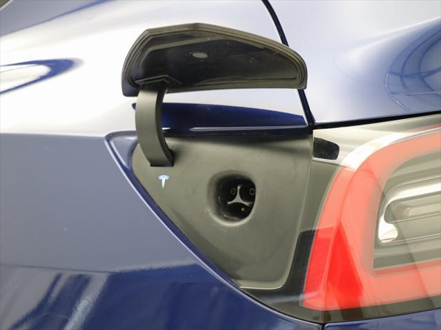 Photo of 2021 Deep Blue Metallic Tesla Model Y