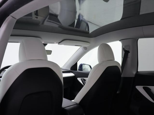 Photo of 2021 Deep Blue Metallic Tesla Model Y