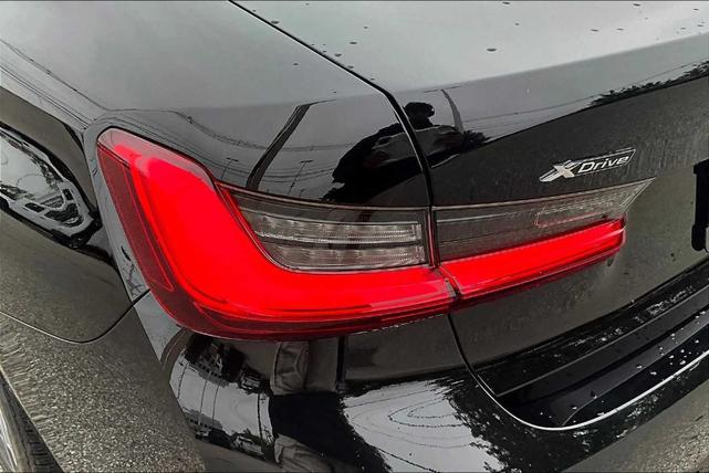 Photo of 2021 Jet Black BMW 330