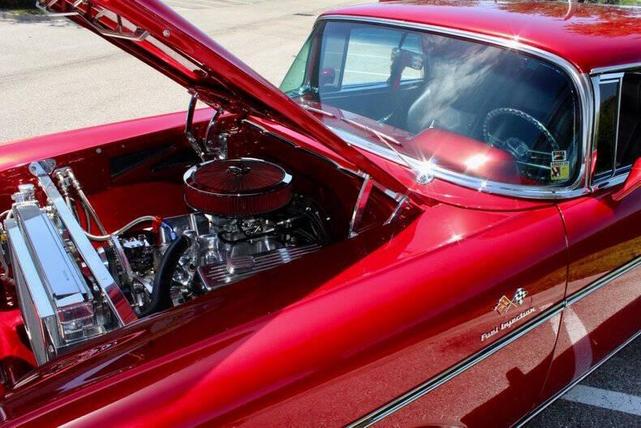 Photo of 1957 Razzberry Candy Apple Red Chevrolet Nomad