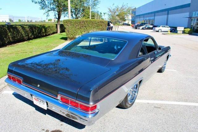 Photo of 1966 Silver and Charcoal Chevrolet Impala