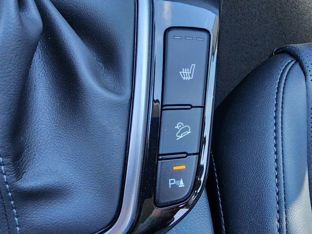 Photo of 2025 Fusion Orange Kia Seltos