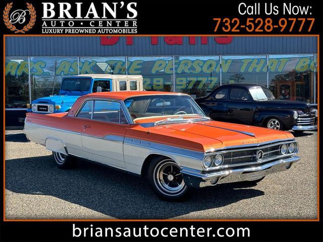 Photo of 1963 Orange w/Gold Flake Buick Wildcat