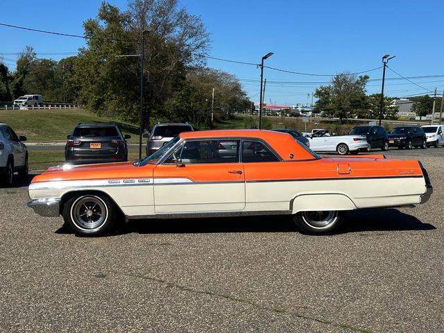 Photo of 1963 Orange w/Gold Flake Buick Wildcat