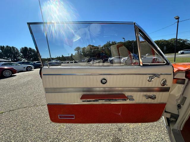 Photo of 1963 Orange w/Gold Flake Buick Wildcat
