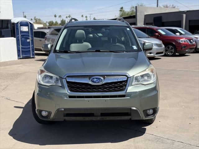Photo of 2014 Jasmine Green Metallic Subaru Forester