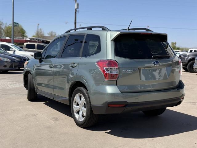 Photo of 2014 Jasmine Green Metallic Subaru Forester