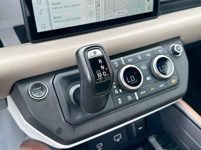 Photo of 2021 Tasman Blue Metallic Land Rover Defender