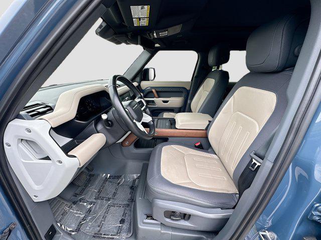Photo of 2021 Tasman Blue Metallic Land Rover Defender