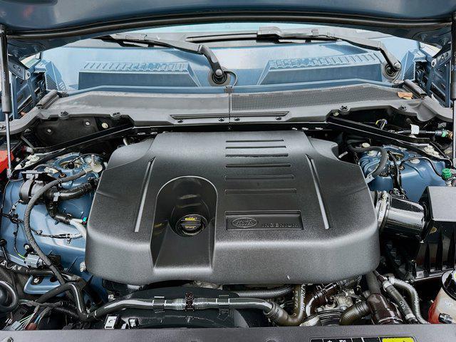 Photo of 2021 Tasman Blue Metallic Land Rover Defender