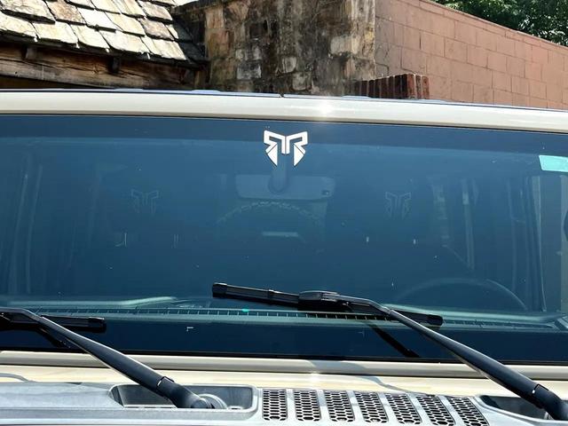 Photo of 2021 Beige Jeep Wrangler Unlimited
