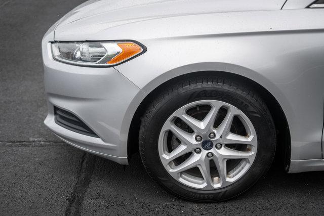 Photo of 2014 Ingot Silver Metallic Ford Fusion