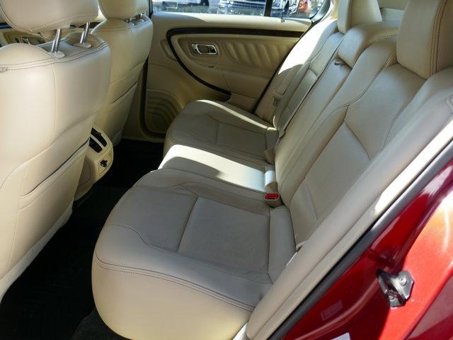 Photo of 2016 Ruby Red Tinted Ford Taurus