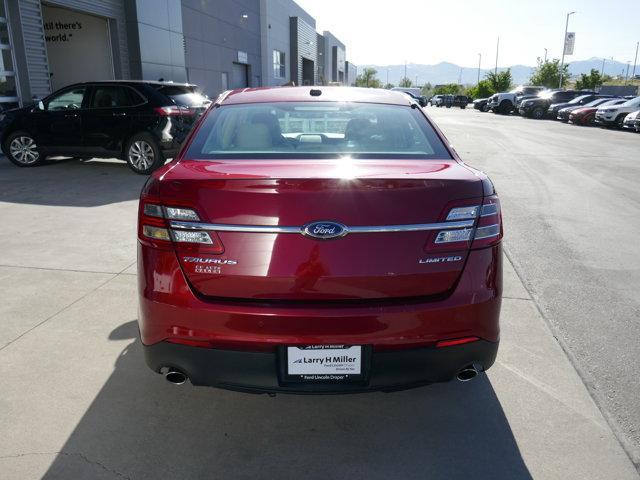 Photo of 2016 Ruby Red Tinted Ford Taurus