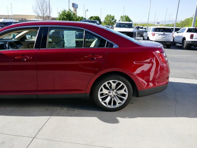 Photo of 2016 Ruby Red Tinted Ford Taurus