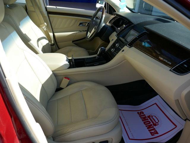 Photo of 2016 Ruby Red Tinted Ford Taurus
