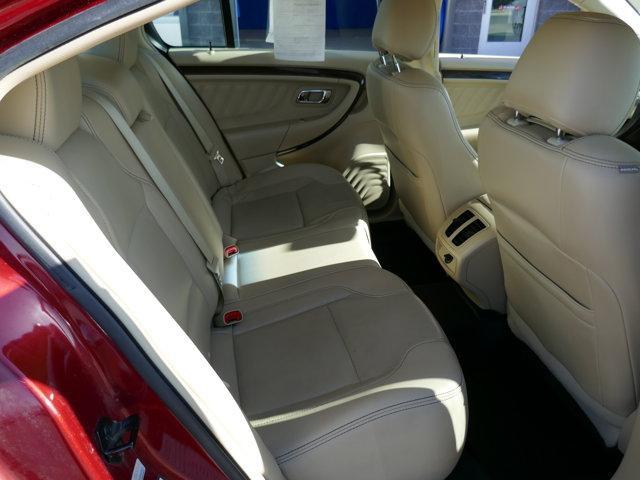 Photo of 2016 Ruby Red Tinted Ford Taurus