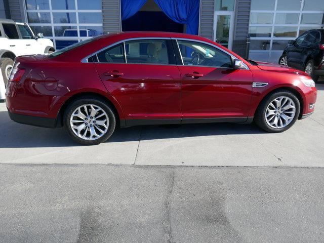 Photo of 2016 Ruby Red Tinted Ford Taurus