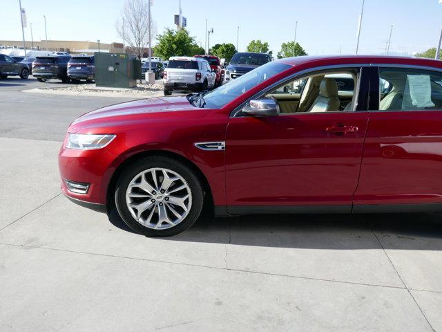 Photo of 2016 Ruby Red Tinted Ford Taurus