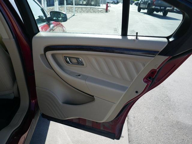 Photo of 2016 Ruby Red Tinted Ford Taurus