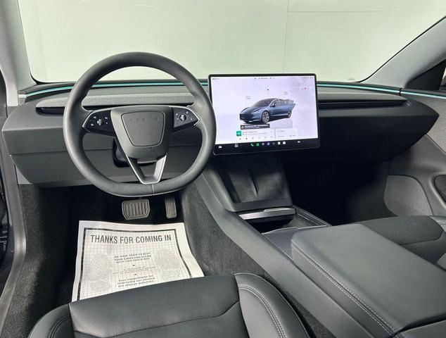 Photo of 2024 Solid Black Tesla Model 3