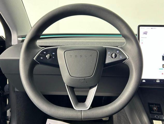 Photo of 2024 Solid Black Tesla Model 3