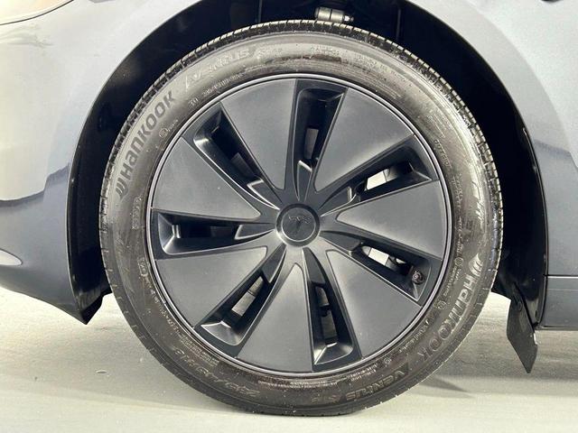 Photo of 2024 Solid Black Tesla Model 3