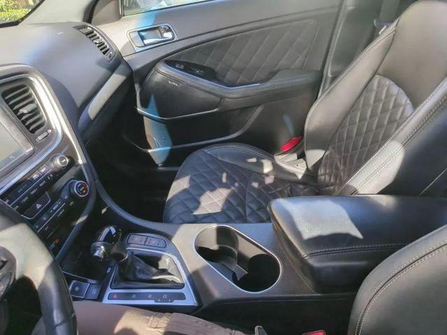 Photo of 2014 Titanium Silver Kia Optima