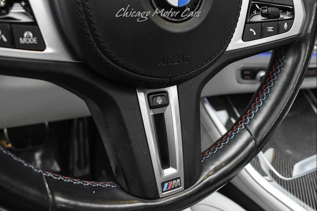 Photo of 2022 Alpine White (Satin Black Wrap) BMW X5 M