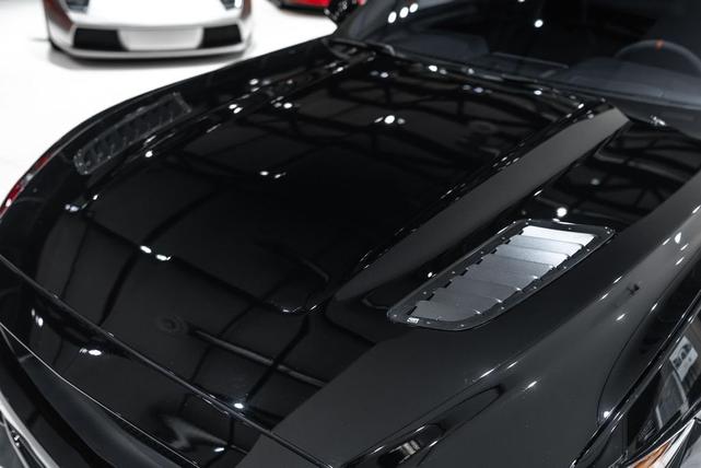Photo of 2015 Black Ford Mustang