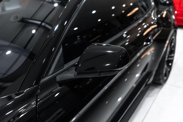 Photo of 2015 Black Ford Mustang