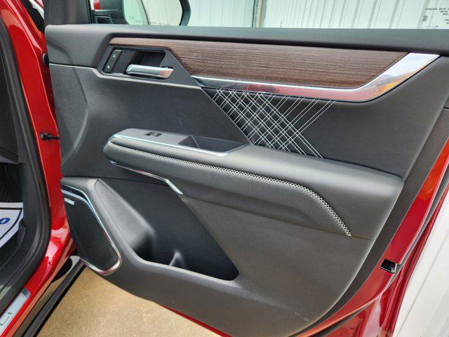 Photo of 2026 Volcanic Red Tintcoat GMC Acadia