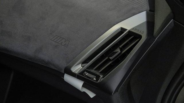 Photo of 2026 Black Sapphire Metallic BMW iX