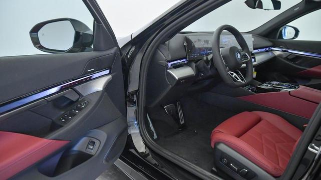 Photo of 2025 Black Sapphire Metallic BMW i5