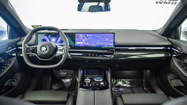Photo of 2025 Oxide Grey Metallic BMW 530