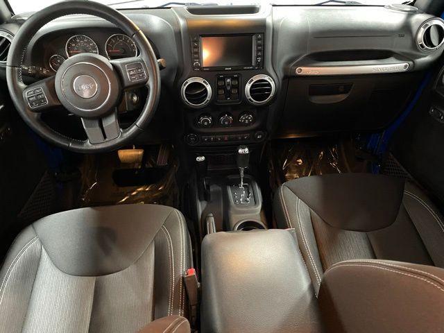 Photo of 2016 Hydro Blue Pearl Jeep Wrangler Unlimited